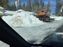 Snow plow working in Arnold area along HWY 4