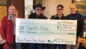 SAF Executive Director Darrell Slocum far right presents check to The tuolumne County Sheriff's Posse members