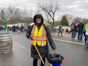 Dist. 3 Supervisor Merita Callaway picking up after the Murphys Irish Day Parade