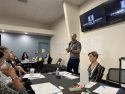 Tyler Newton speaks at Housing Collaborative meeting