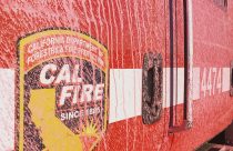 Cal Fire truck covered in fire retardant
