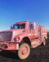 Cal Fire truck covered in fire retardant