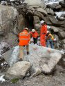 Caltrans crews work to remove a boulder on Highway 108-Sonora Pass