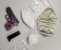 Drugs, guns and cash seized