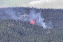 Plane dropping retardant on two fires on the Stanislaus National Forest in the Pinecrest area of Tuolumne County