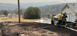 Structure Fire In Rancho Calaveras that spread to small spot of vegetation