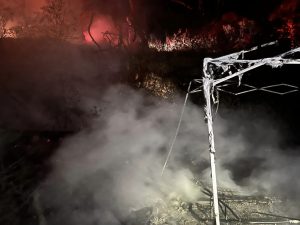 Vegetation fire ignited in a Valley Springs homeless camp