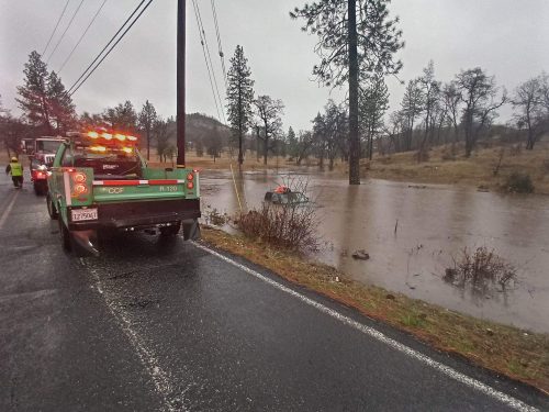 Rescue crews work on truck found in flooded area off Rail Road Flat Road
