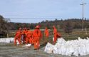 Calaveras County Vallecito Camp crews filling sandbags