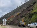 Caltrans crews work to remove a landslide on HWY 140 in Mariposa County