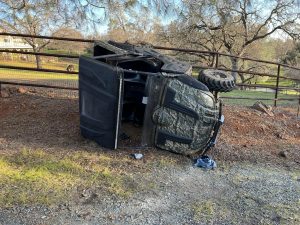 UTV rolled on its side