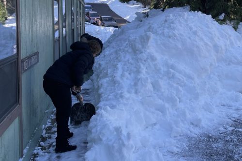 Shoveling snow in Arnold area of Calaveras County