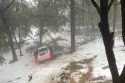 Stolen truck stopped on snowy, muddy roadway