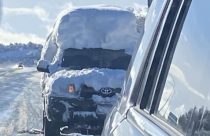 Vehicle with snow piled on top