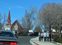 Traffic being directed on Washington Street and students stand nearby