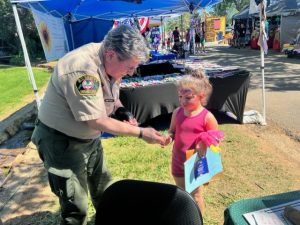 CCSO volunteer working the fair