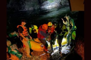 Calaveras County Sheriff's SAR team using ropes and raft to rescue man