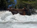 Historical Landmark sign still half way covered with snowHistorical Landmark sign still half way covered with snowHistorical Landmark sign still half way covered with snow
