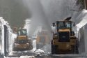 Snow plows working on Highway 120 Tioga Pass in Yosemite National Park