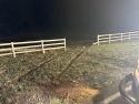 Fence that driver plowed through during chase