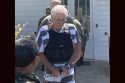 Edward Fredrick Wackerman leaving court after his first appearance