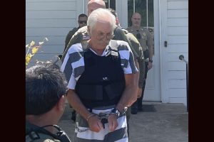 Edward Fredrick Wackerman leaving court after his first appearance