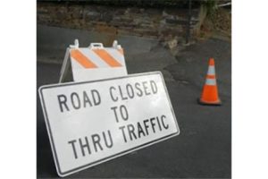 Road closed to thru traffic sign