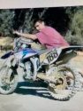 Daniel Kapumau with motorcycle
