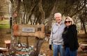 Bob Barker and Nancy Burnet in front of the Bob Barker Bear Habitat at PAWS' ARK 2000 sanctuary – a gift from Bob's DJ&T Foundation.