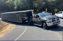 Truck with trailer stuck on Highway 49 hairpin turn in the Tuttletown area of Tuolumne County