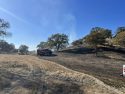 Escaped debris burn fire behind Elizabeth Court in Burson