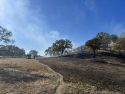 Escaped debris burn fire behind Elizabeth Court in Burson