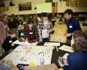 hands-on project involving gumdrops at table with students