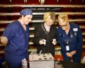 hands-on medical demonstration with two nurses and a student