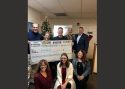 Interfaith Cash Drive (top L-R) Darrell Slocum, Cathie Peacock, Lloyd Mathiesen, Mark Grauer, Tom Nankival, Aretha Lee, Sabrina Biehl, and Alisha Rock