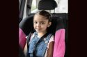 Child in a car safety seat