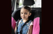 Child in a car safety seat