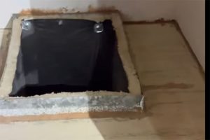 Escape hatch leading to crawl space and back door -- MCSO photo