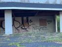 Graffiti on empty building in Sonora off Pesce Way and Hwy 49