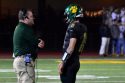 Kirk Clifton speaking with a player last season while still the offensive coordinator
