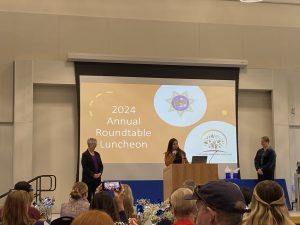 DA Cassandra Jenecke (center) recognizes Jan Fuller (left)