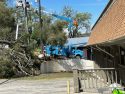 PG&E crew working on downed power pole and lines in Sonora