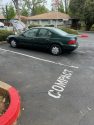 Car engine fire near grass and buildings at the Tuolumne City Senior Apartments