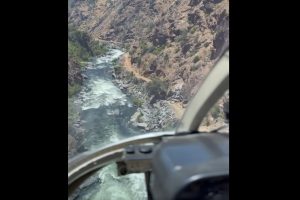 CHP helicopter flying over the Merced River trail searching for missing hikers
