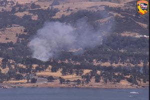 Fiddle Fire burning near New Hogan Lake in Valley Springs -- PG&E camera