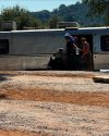 Water being handed out for pets Camp Justice -- TCAC photo