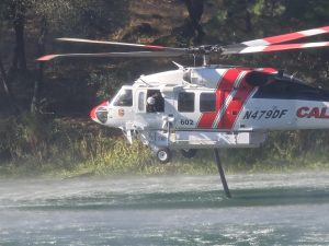 Helicopter assisting in battling Tuolumne County fires