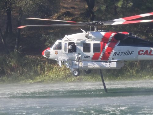 Helicopter assisting in battling Tuolumne County fires