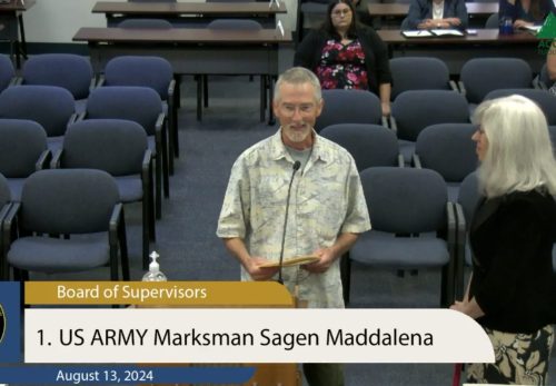Randy Maddalena receives a proclamation on behalf of daughter Sagen.