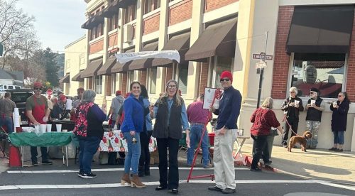 Ringing the bell at the Bean Feed
